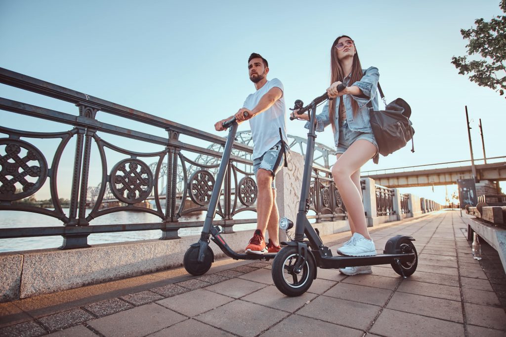 Couple on electric scooter
